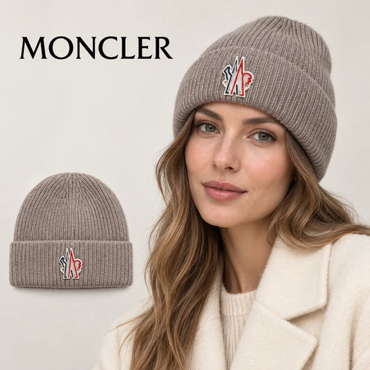 Moncler beanie worn by an adult female model, with product detail inset.
