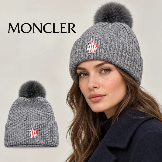 Moncler beanie worn by an adult female model, with product detail inset.