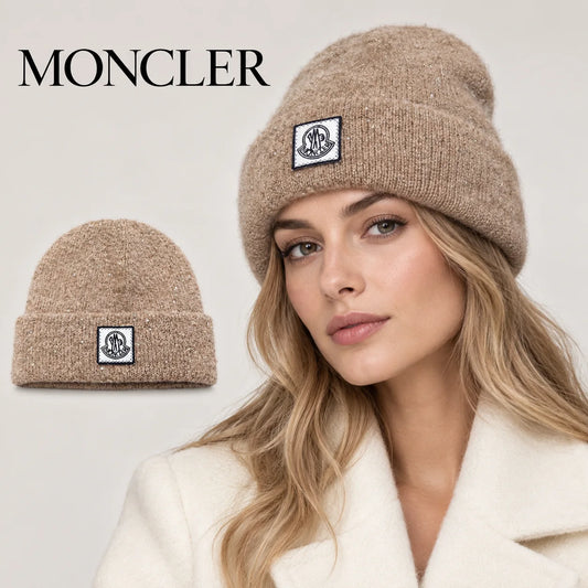 Moncler beanie worn by an adult female model, with product detail inset.