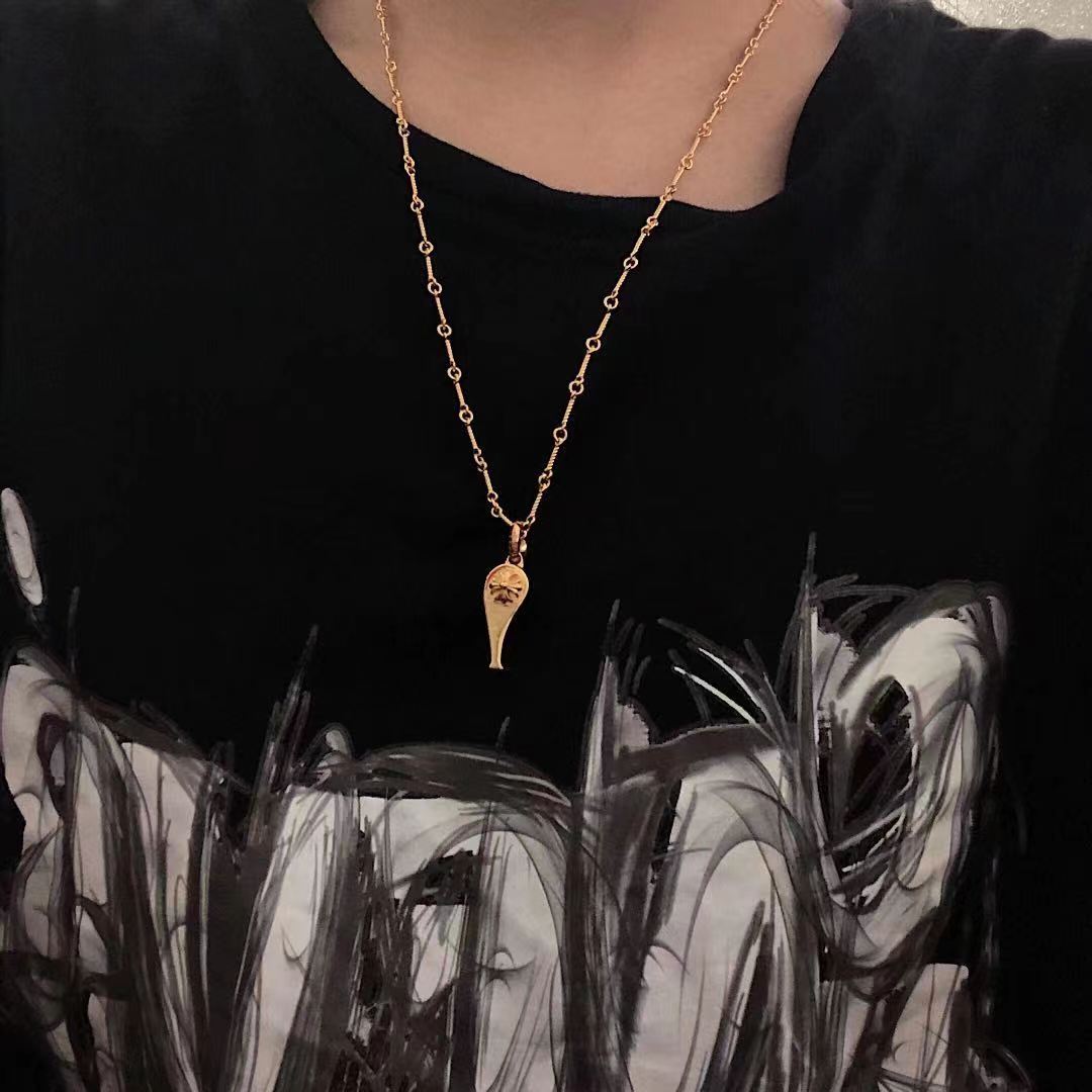 Martin Graham pendant necklace in polished metal-tone – styled product view