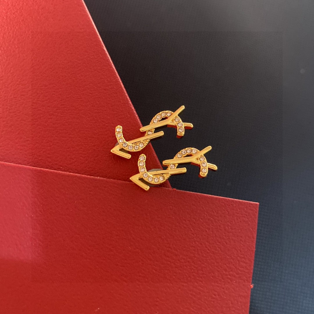 Martin Graham earrings in polished metal-tone – front product view