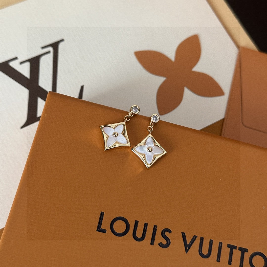 Martin Graham stud earrings in polished metal-tone – front product view