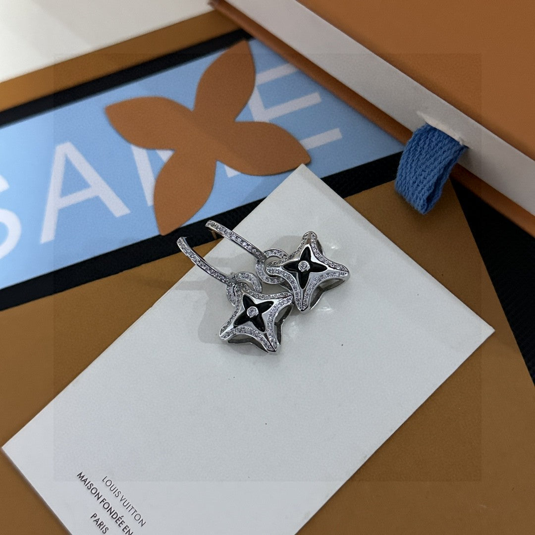 Martin Graham stud earrings in polished metal-tone – side detail