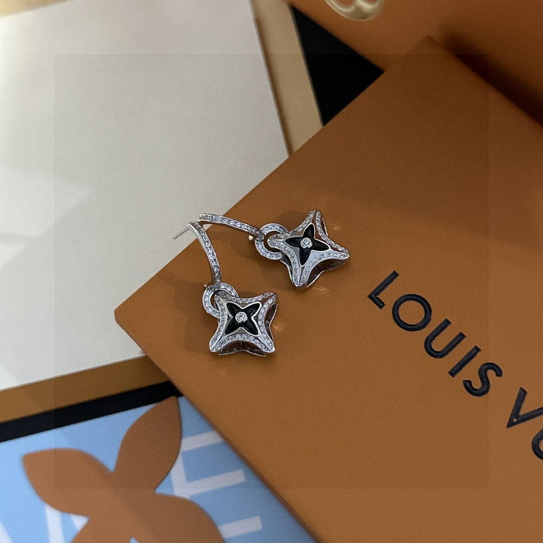 Martin Graham stud earrings in polished metal-tone – detail view