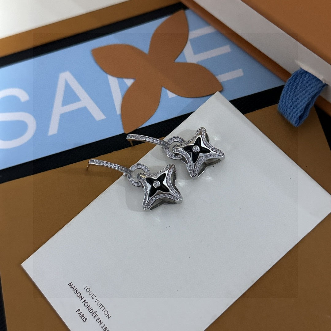Martin Graham stud earrings in polished metal-tone – front product view