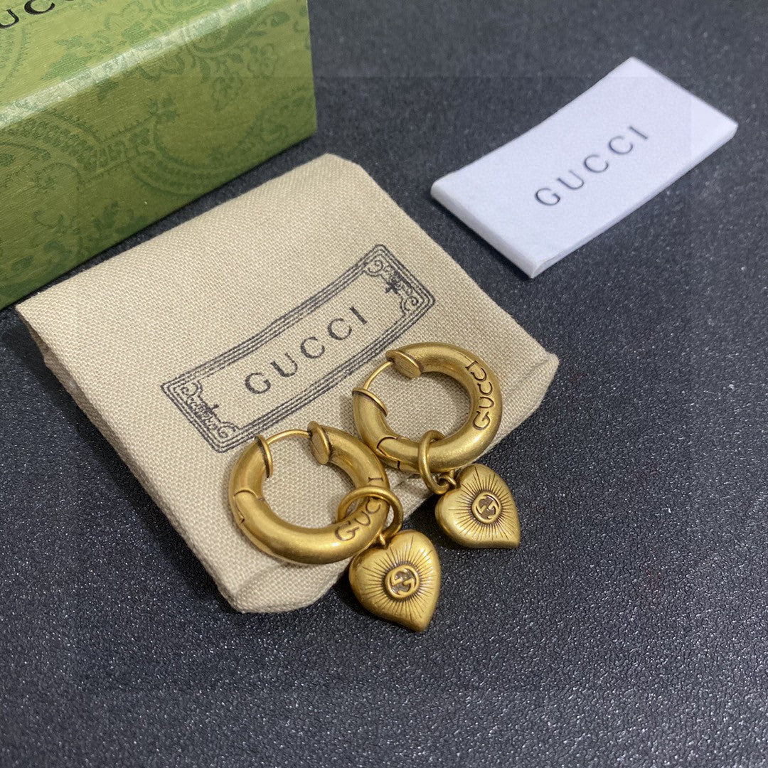 Martin Graham stud earrings in polished metal-tone – main product view