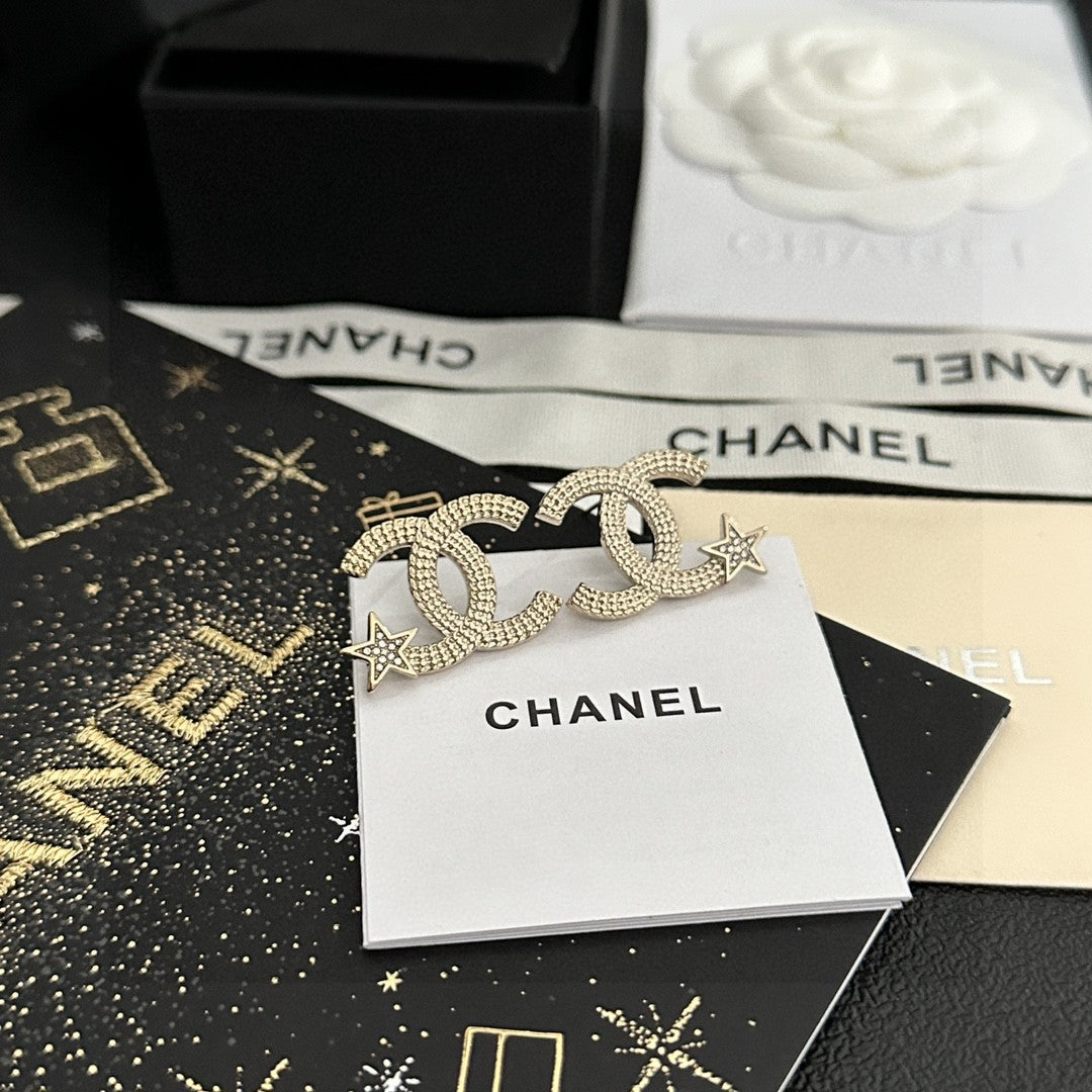 Martin Graham stud earrings in polished metal-tone – front product view