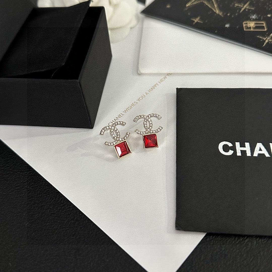 Martin Graham stud earrings in polished metal-tone – side detail
