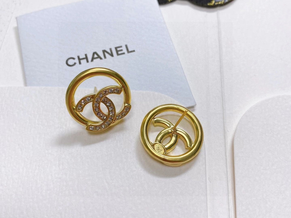 Martin Graham stud earrings in polished metal-tone – side detail