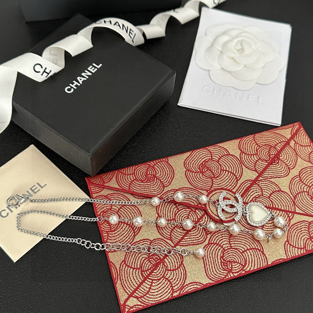Martin Graham pendant necklace in polished metal-tone – front product view