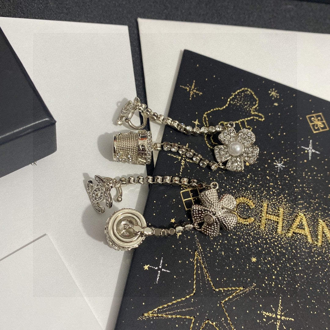 Martin Graham stud earrings in polished metal-tone – front product view