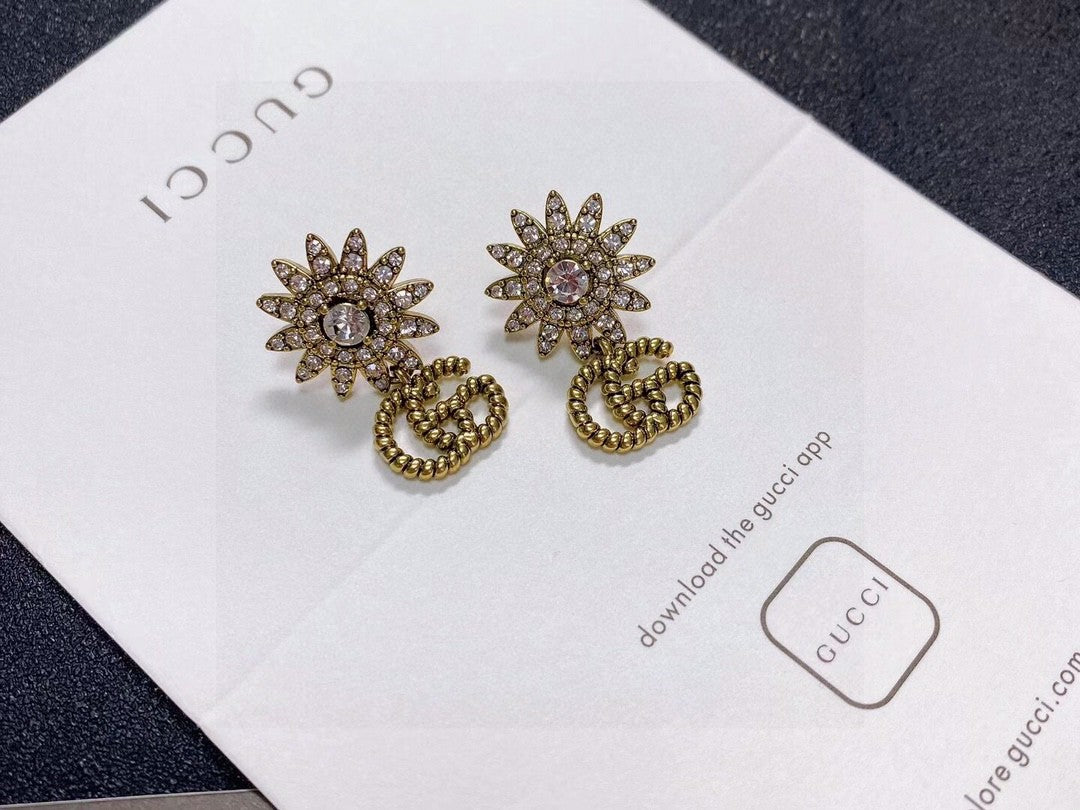 Martin Graham stud earrings in polished metal-tone – main product view