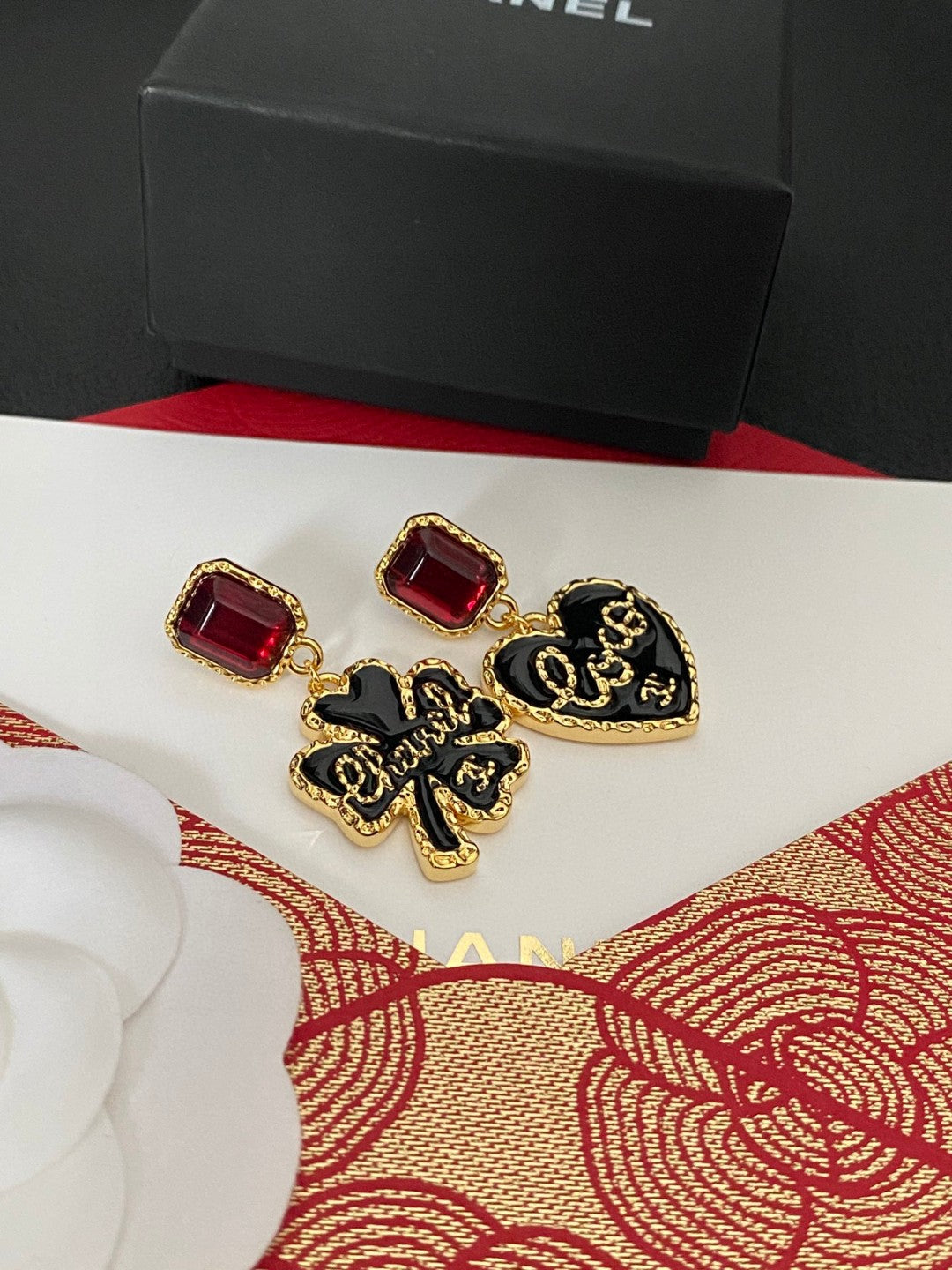 Martin Graham stud earrings in polished metal-tone – front product view