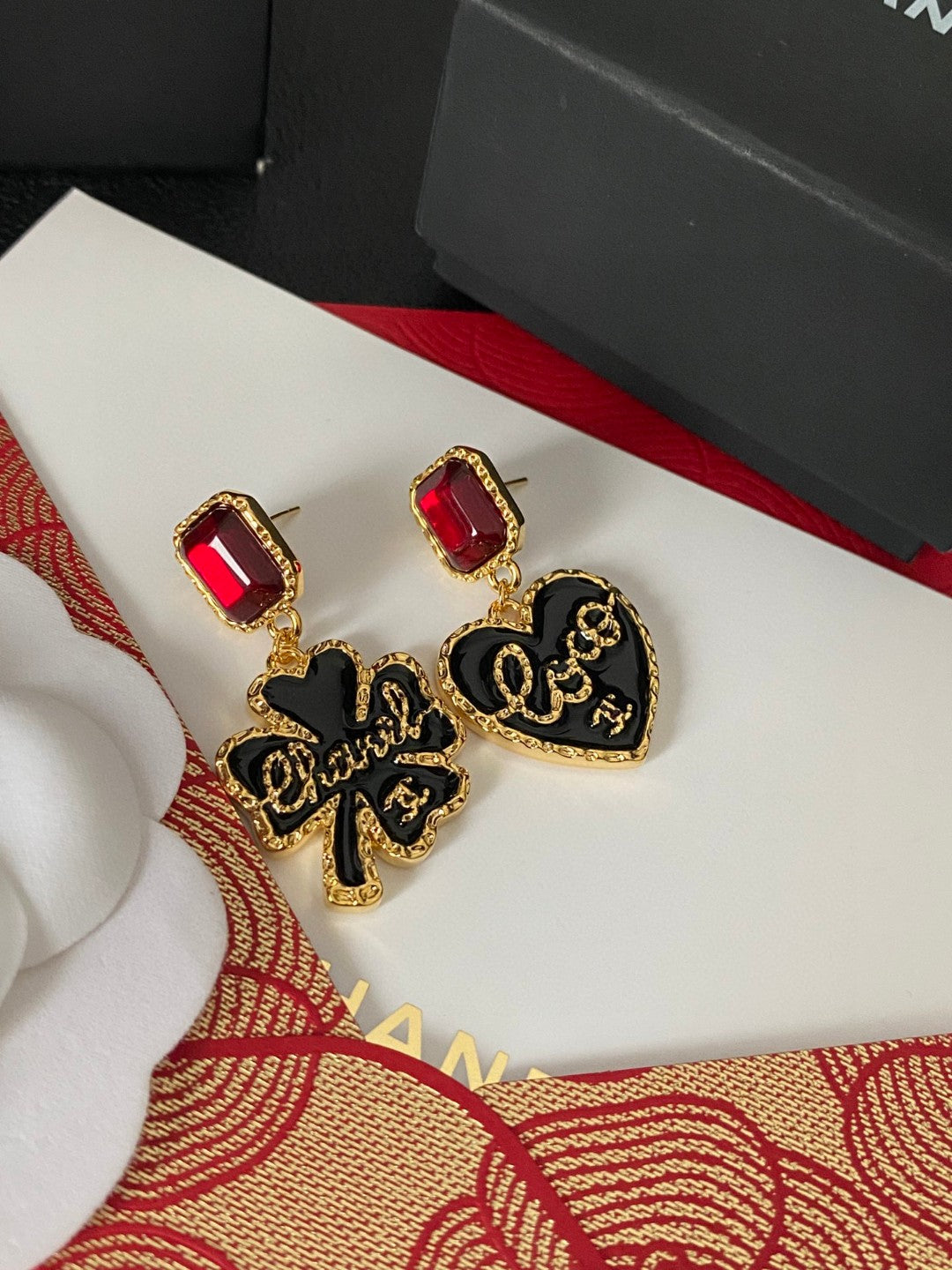 Martin Graham stud earrings in polished metal-tone – detail view