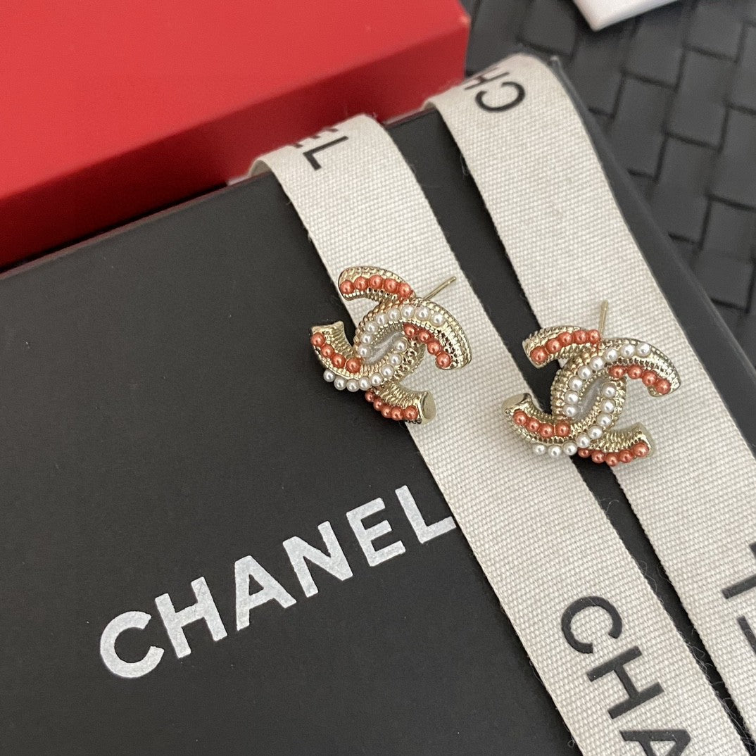 Martin Graham stud earrings in polished metal-tone – detail view