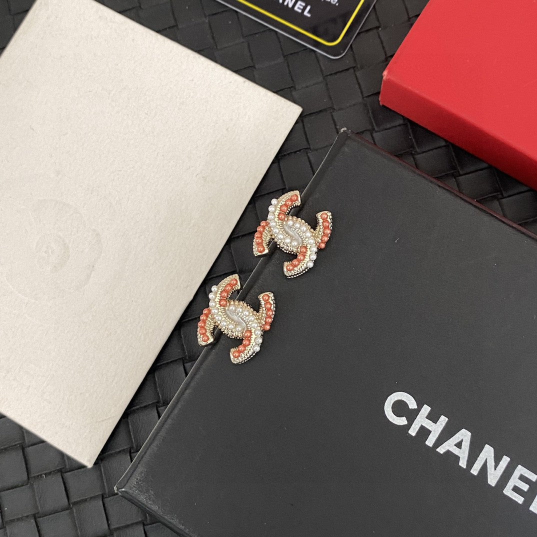 Martin Graham stud earrings in polished metal-tone – side detail