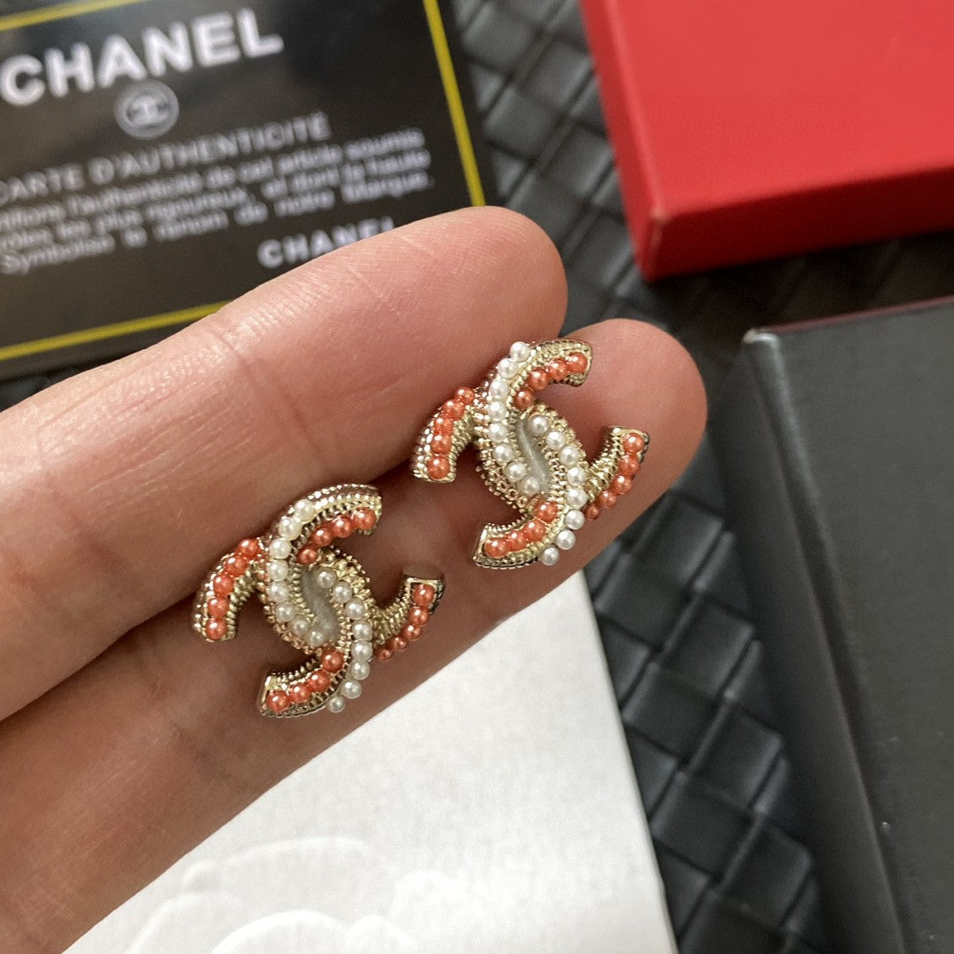 Martin Graham stud earrings in polished metal-tone – front product view