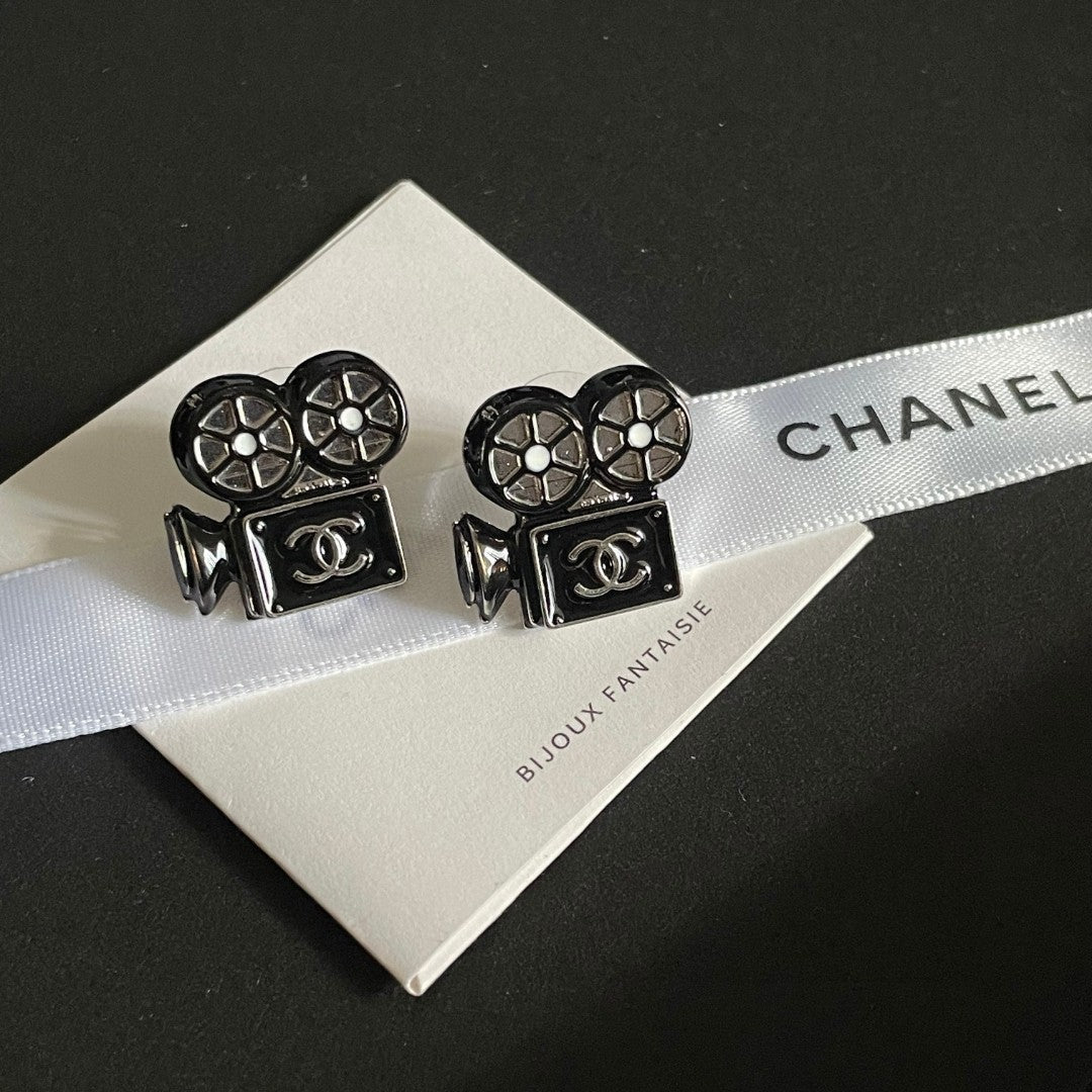 Martin Graham stud earrings in polished metal-tone – side detail