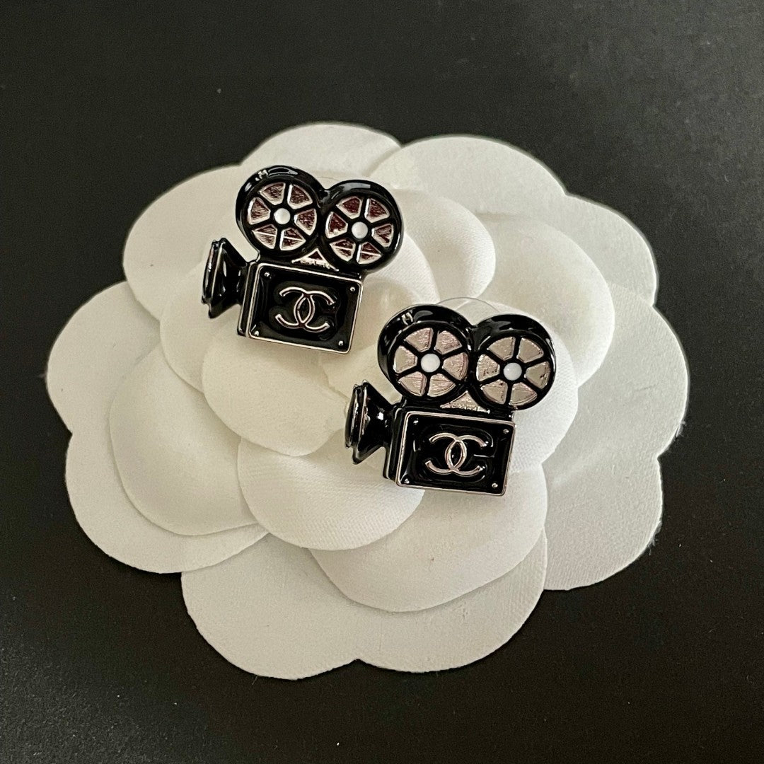 Martin Graham stud earrings in polished metal-tone – main product view