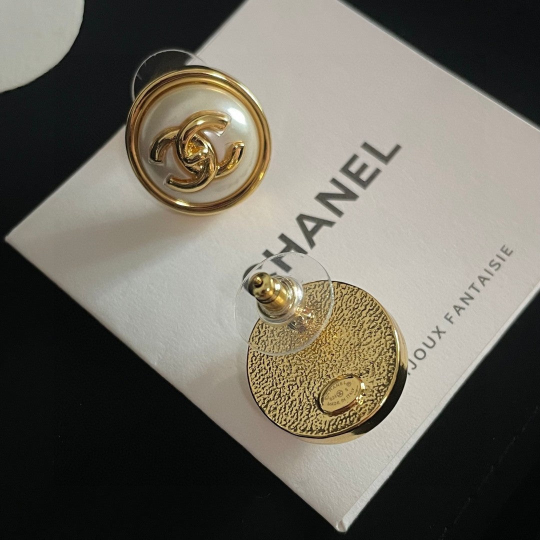 Martin Graham stud earrings in polished metal-tone – main product view