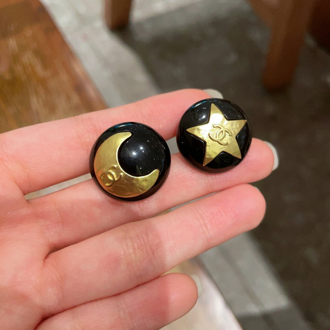 Martin Graham stud earrings in polished metal-tone – close-up detail