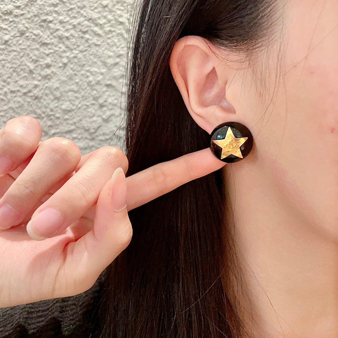 Martin Graham stud earrings in polished metal-tone – front product view