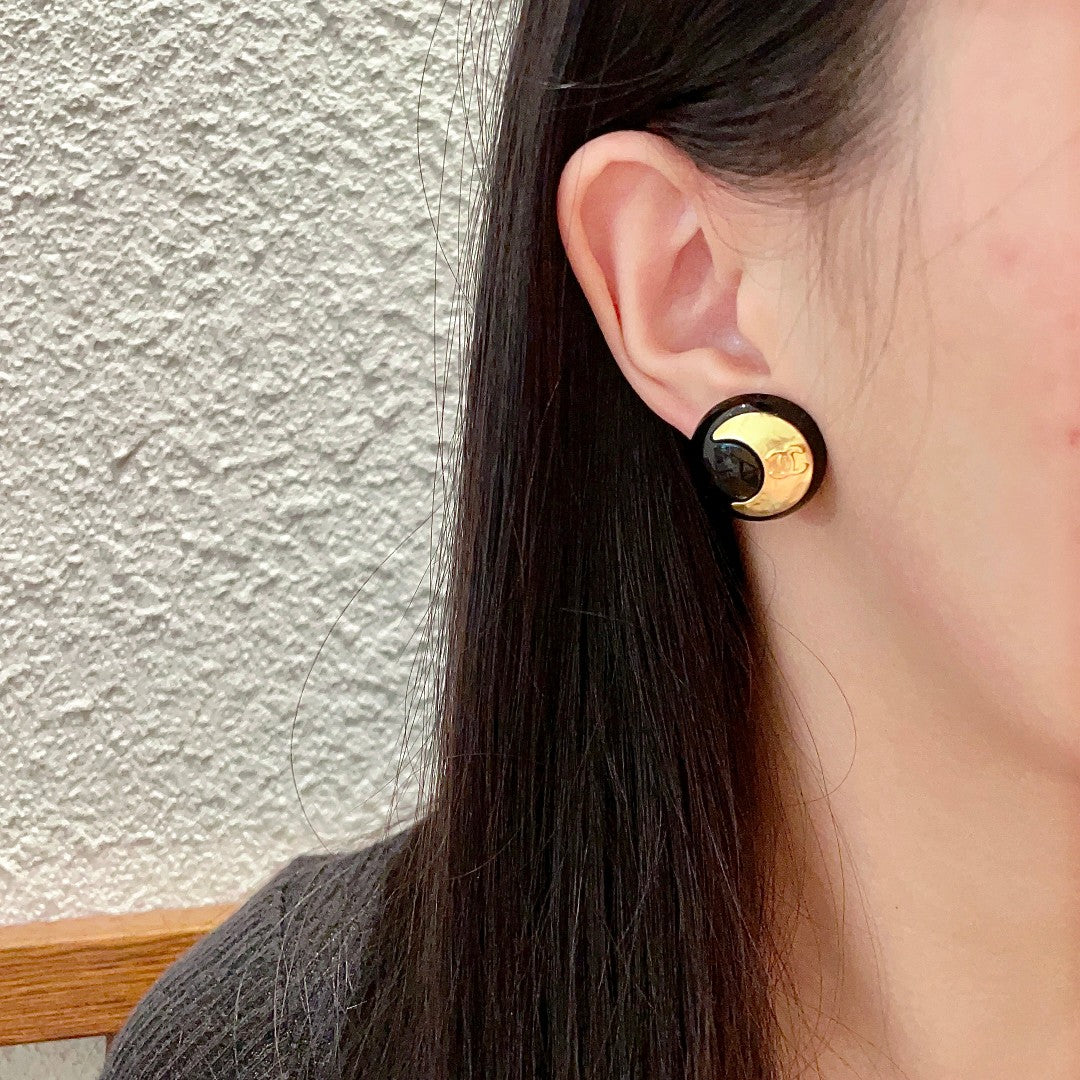 Martin Graham stud earrings in polished metal-tone – side detail