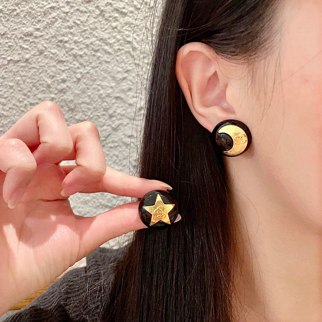 Martin Graham stud earrings in polished metal-tone – detail view