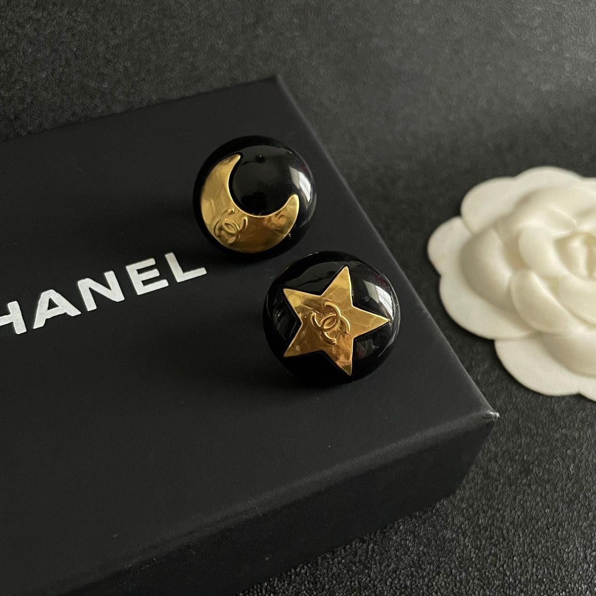 Martin Graham stud earrings in polished metal-tone – detail view