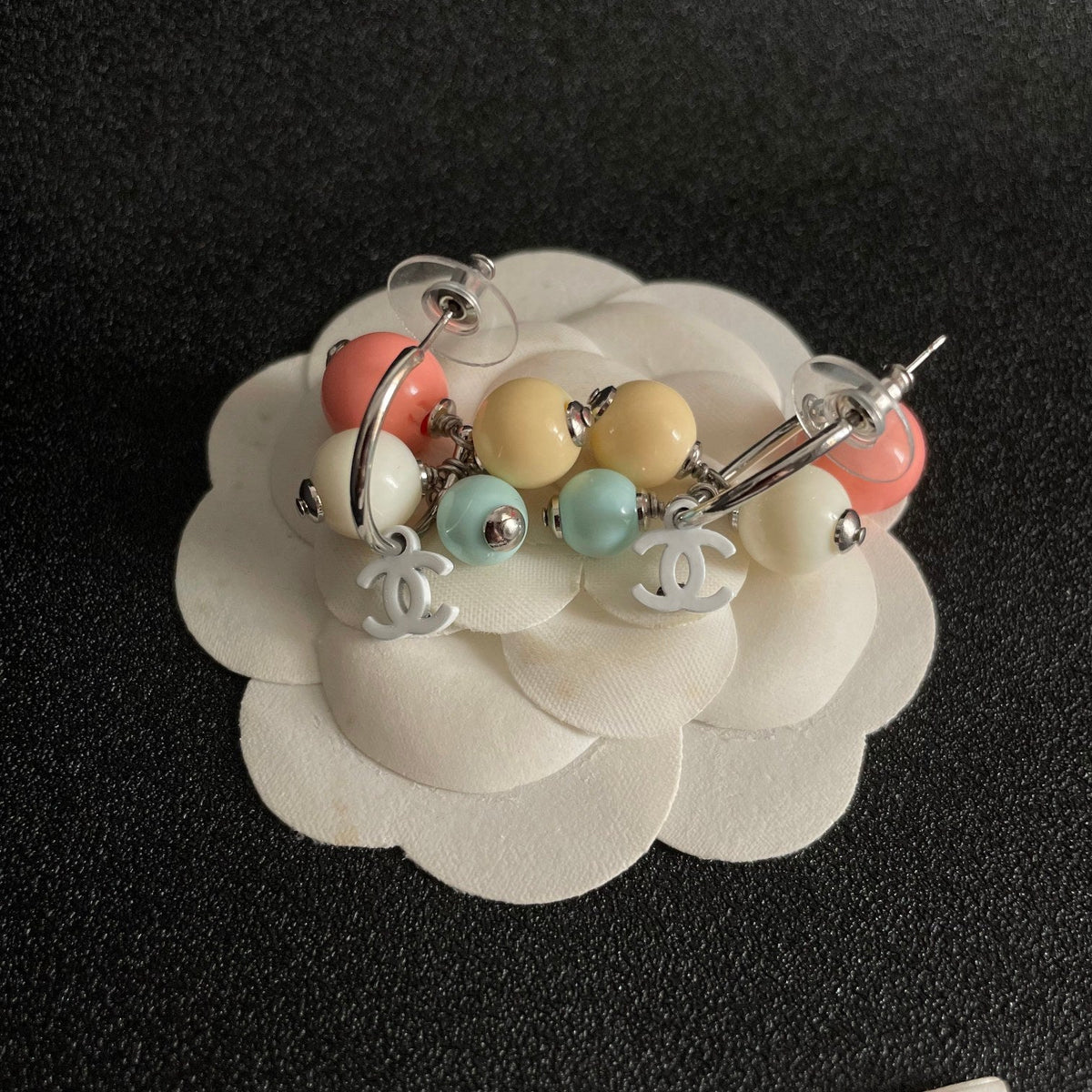 Martin Graham earrings in polished metal-tone – front product view
