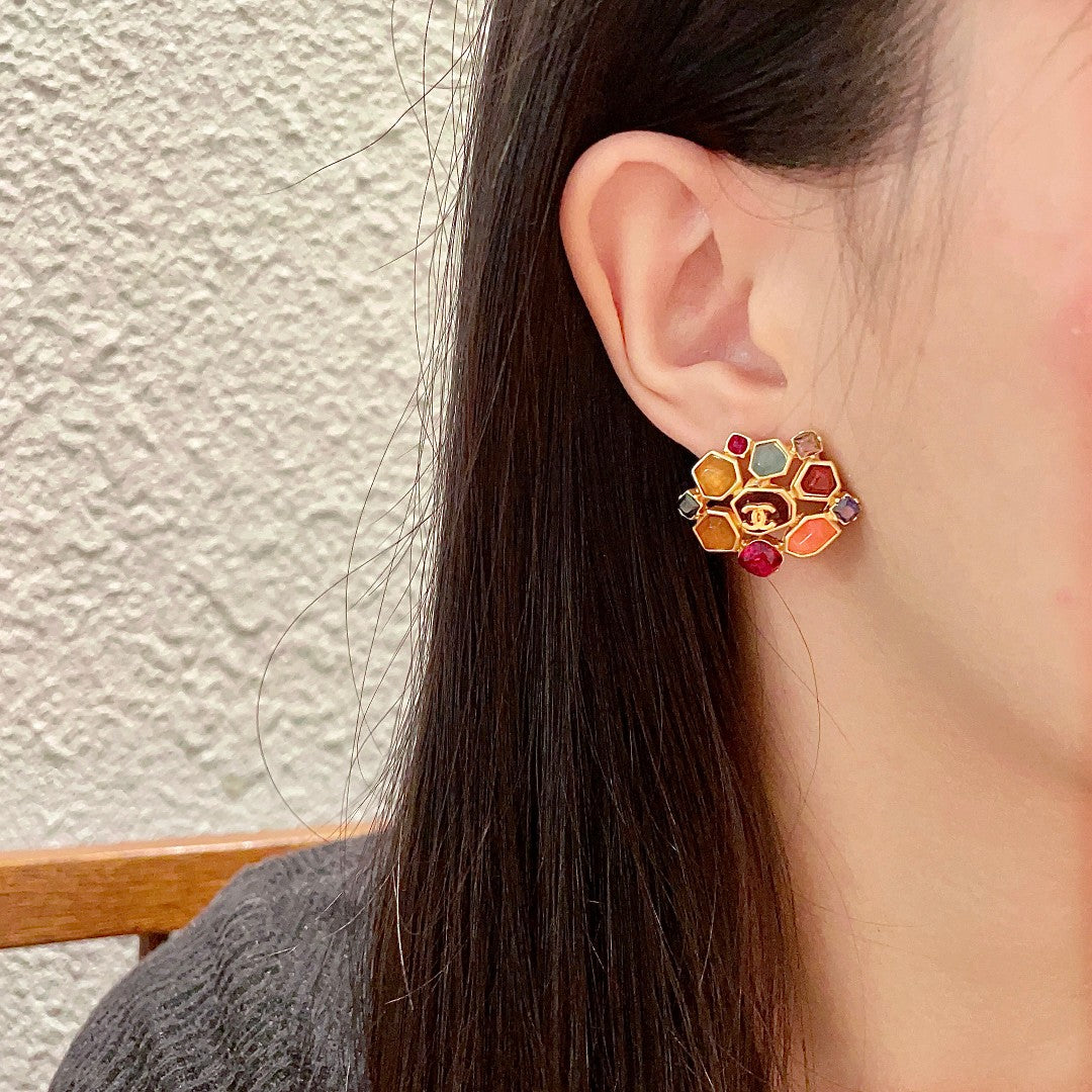Martin Graham stud earrings in polished metal-tone – detail view