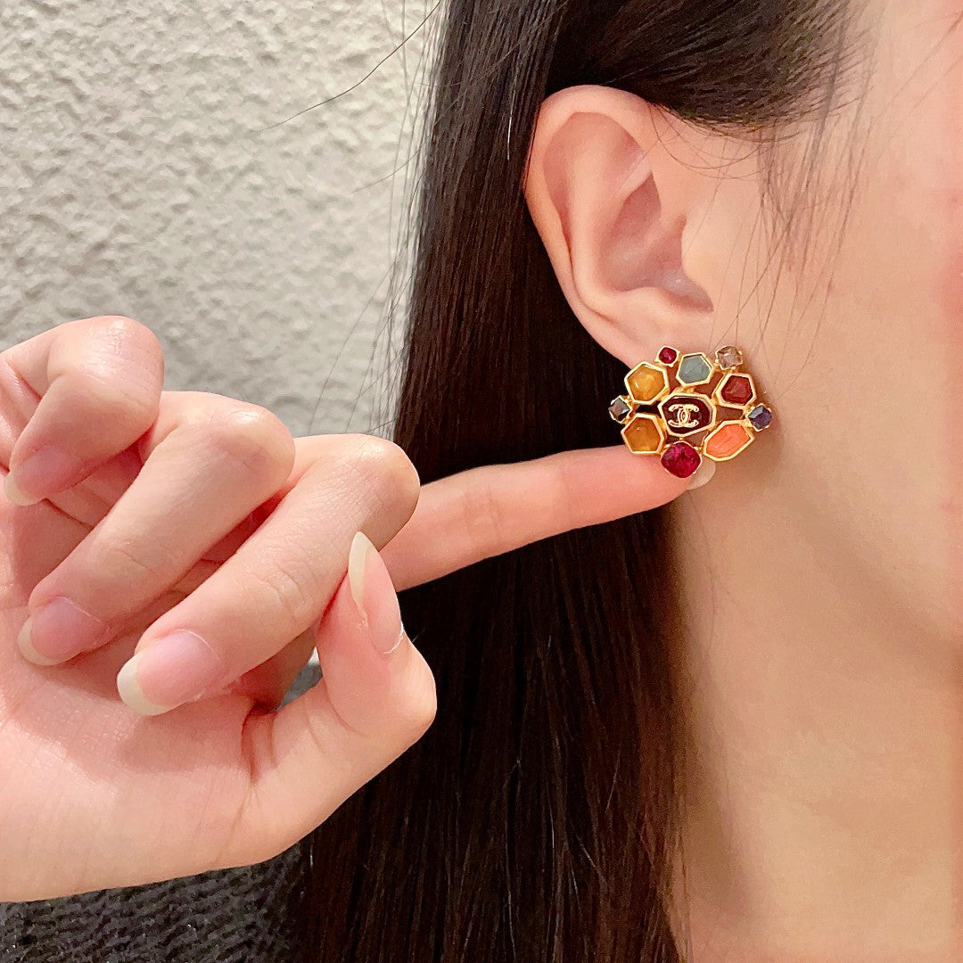 Martin Graham stud earrings in polished metal-tone – front product view