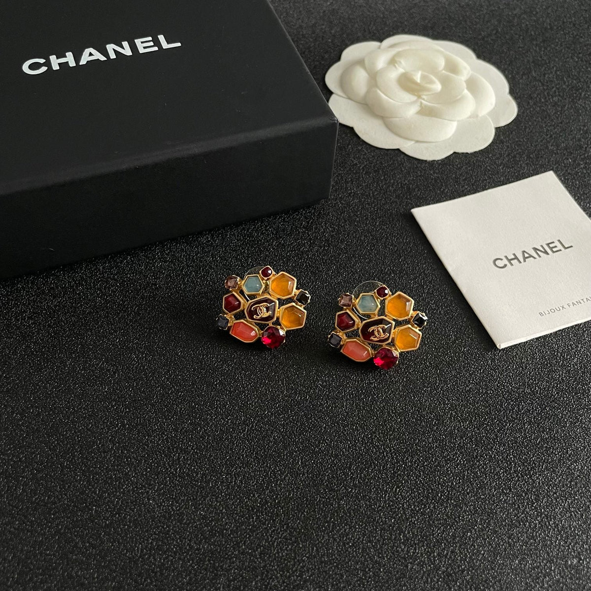 Martin Graham stud earrings in polished metal-tone – styled product view