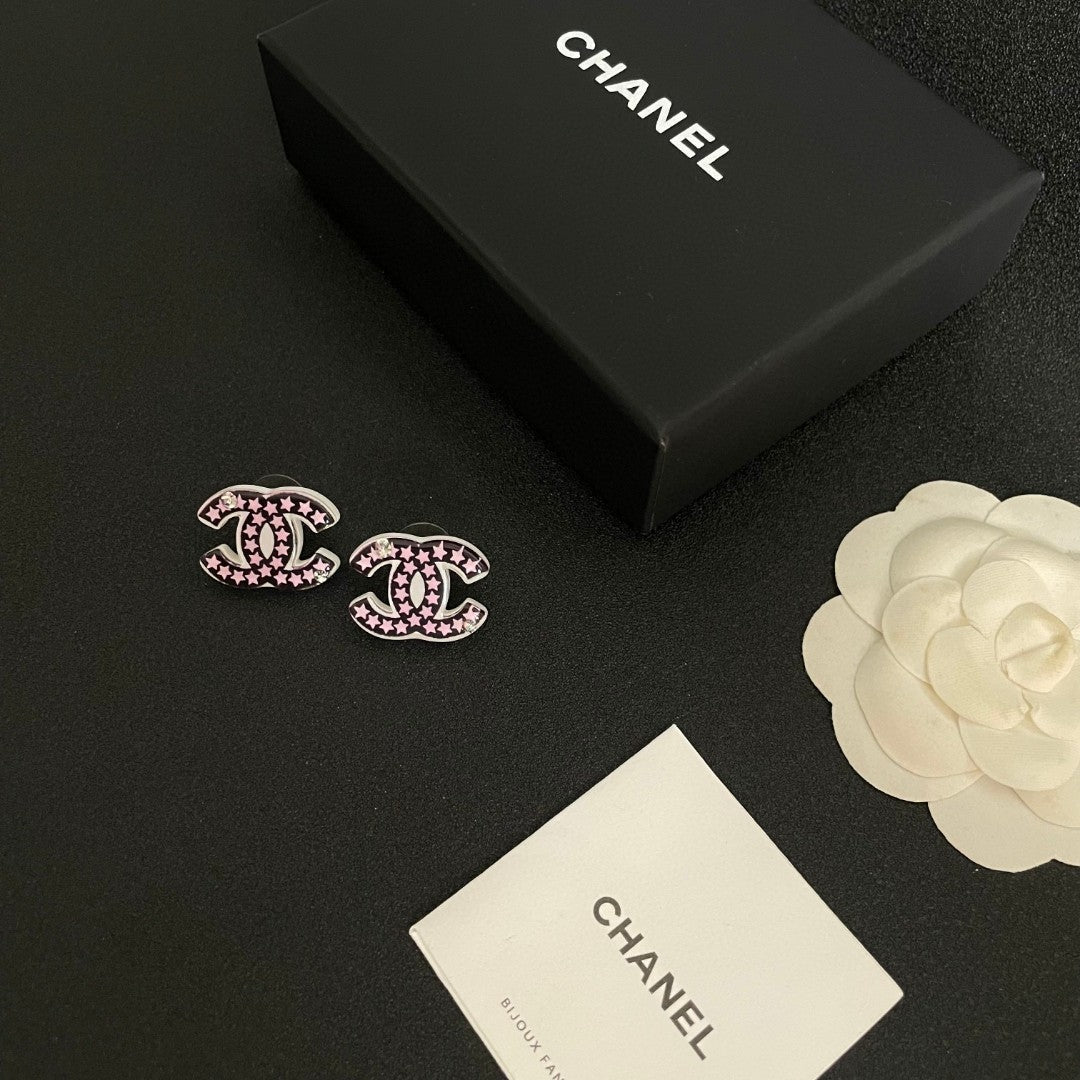 Martin Graham stud earrings in polished metal-tone – close-up detail