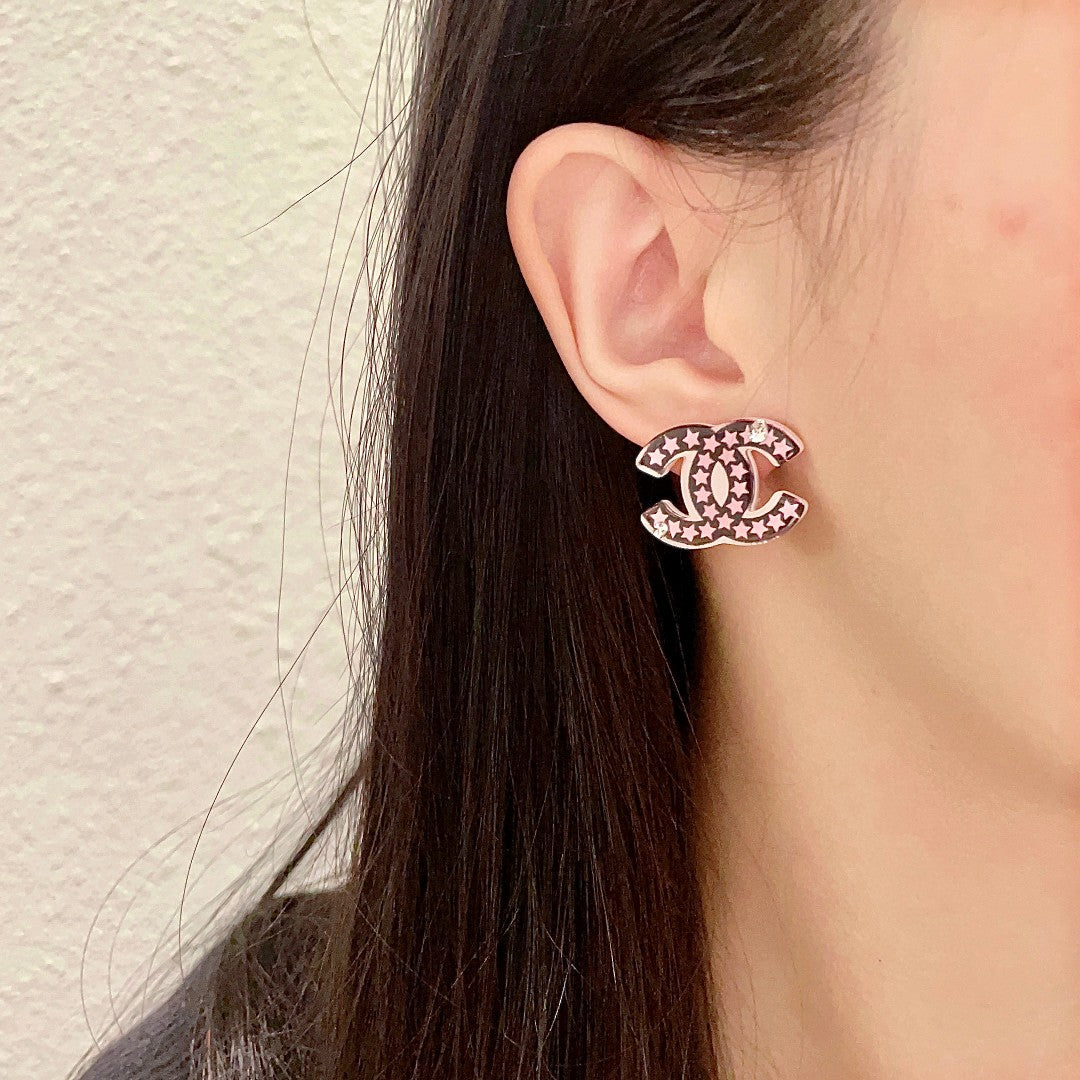Martin Graham stud earrings in polished metal-tone – detail view