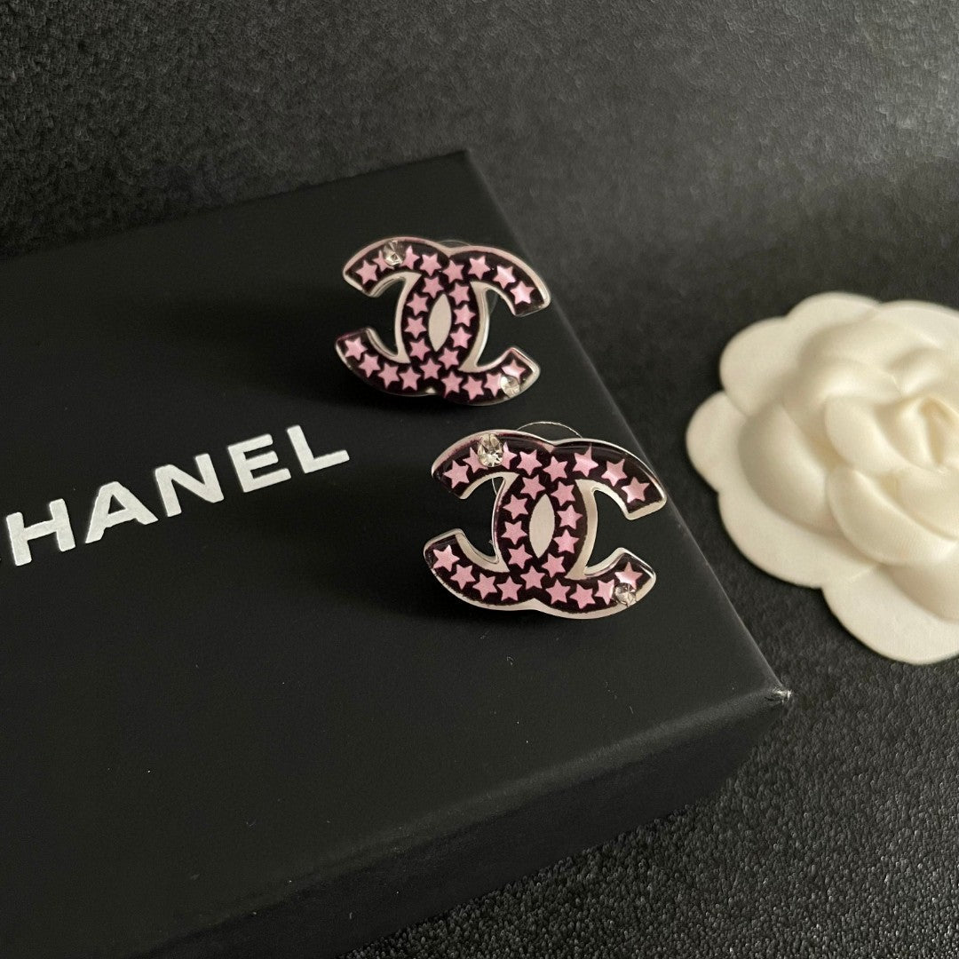 Martin Graham stud earrings in polished metal-tone – detail view