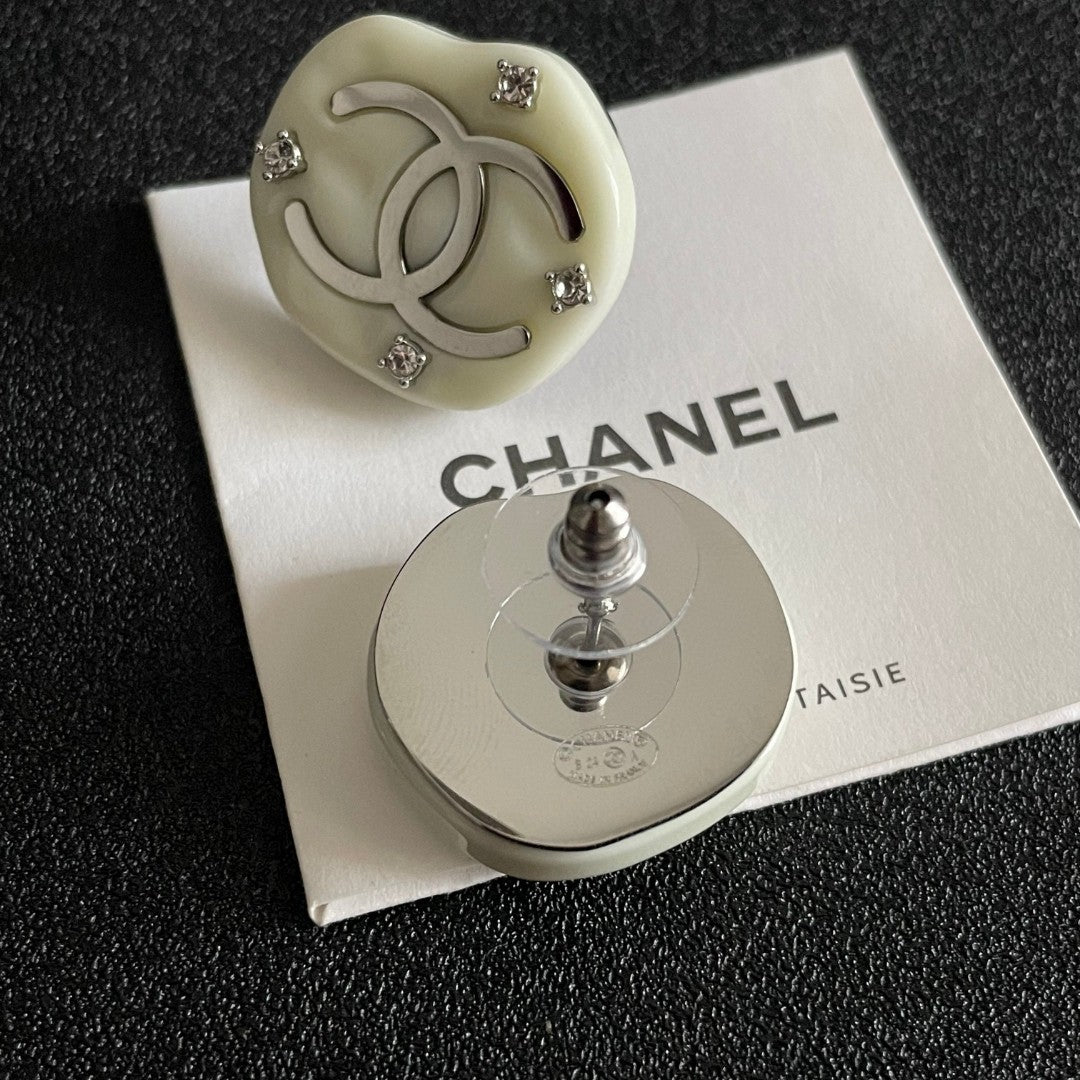 Martin Graham stud earrings in polished metal-tone – main product view