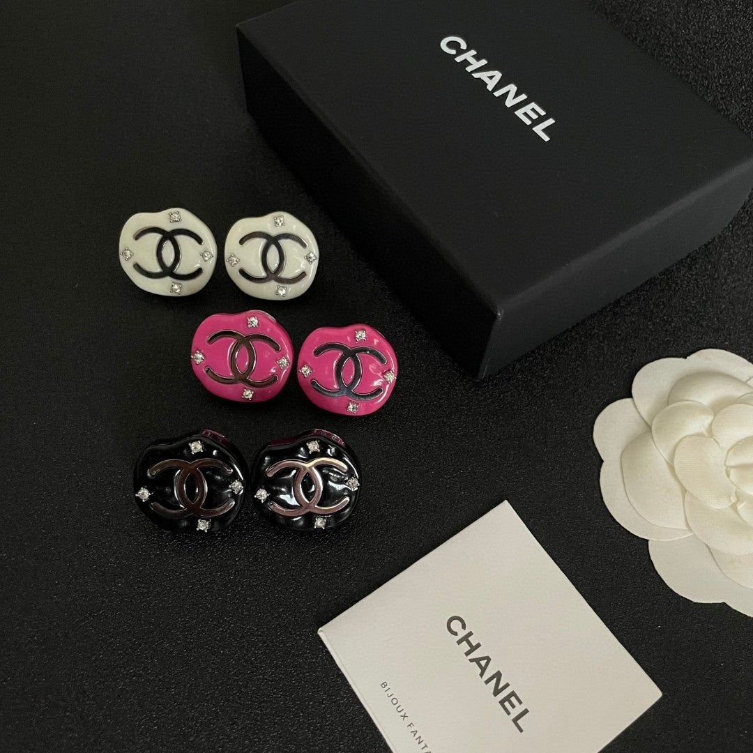 Martin Graham stud earrings in polished metal-tone – side detail