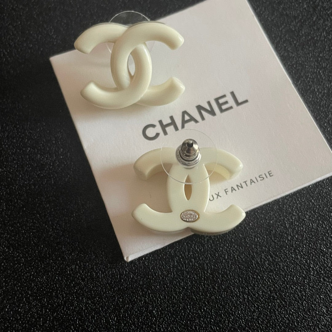 Martin Graham stud earrings in polished metal-tone – main product view