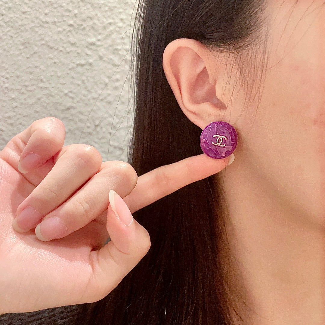 Martin Graham stud earrings in polished metal-tone – front product view