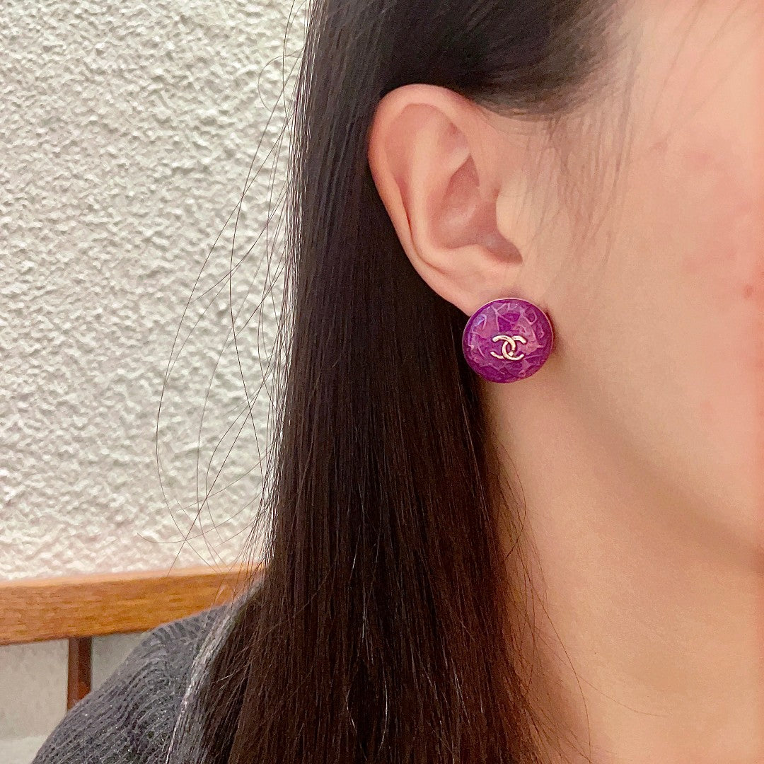 Martin Graham stud earrings in polished metal-tone – detail view