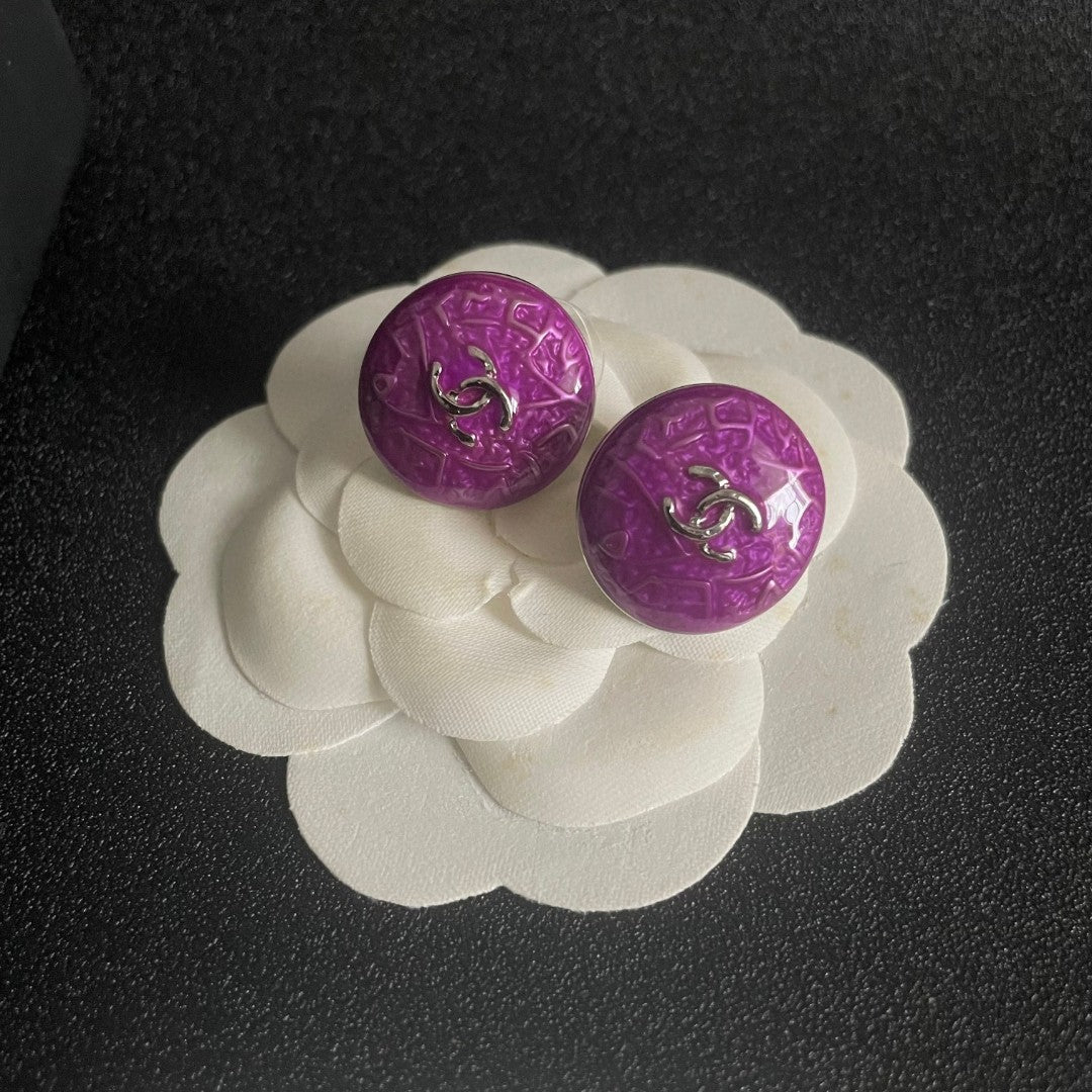 Martin Graham stud earrings in polished metal-tone – front product view
