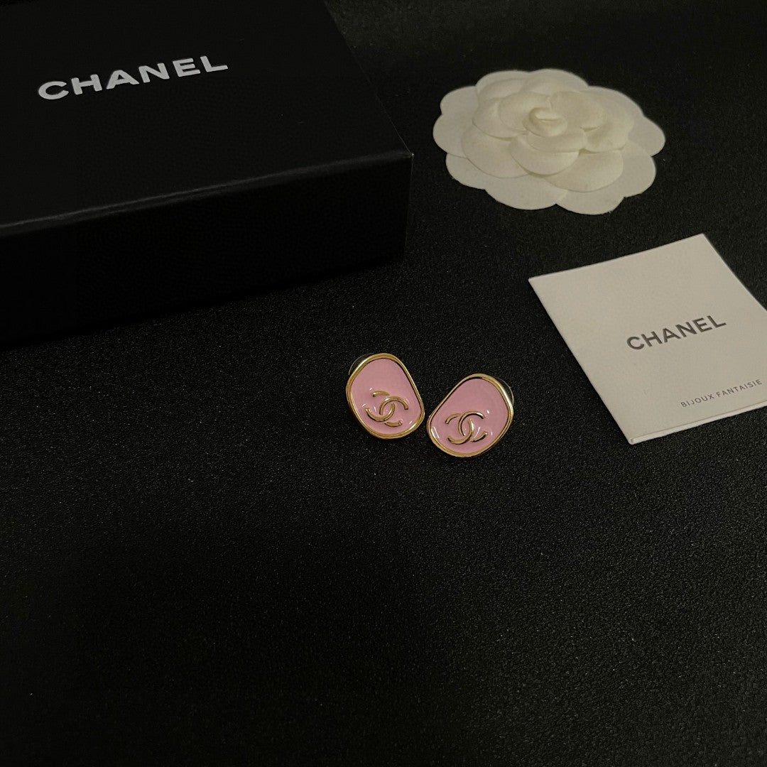 Martin Graham stud earrings in polished metal-tone – styled product view