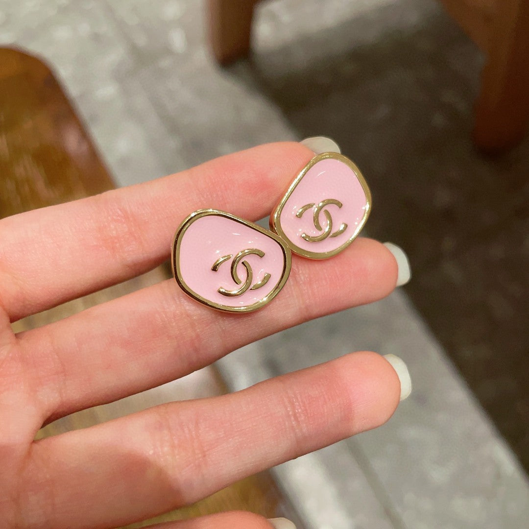 Martin Graham stud earrings in polished metal-tone – side detail
