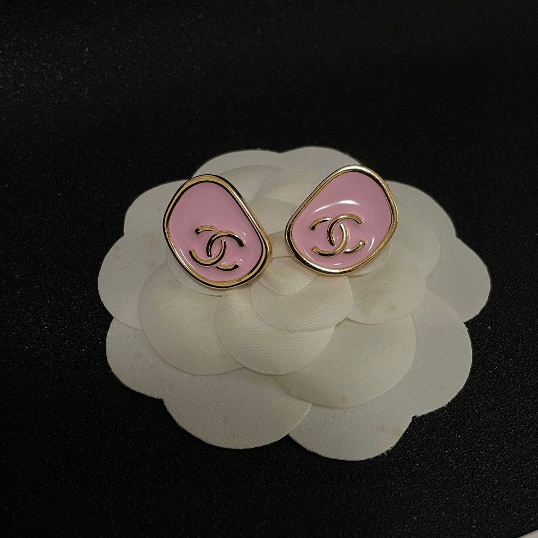 Martin Graham stud earrings in polished metal-tone – front product view