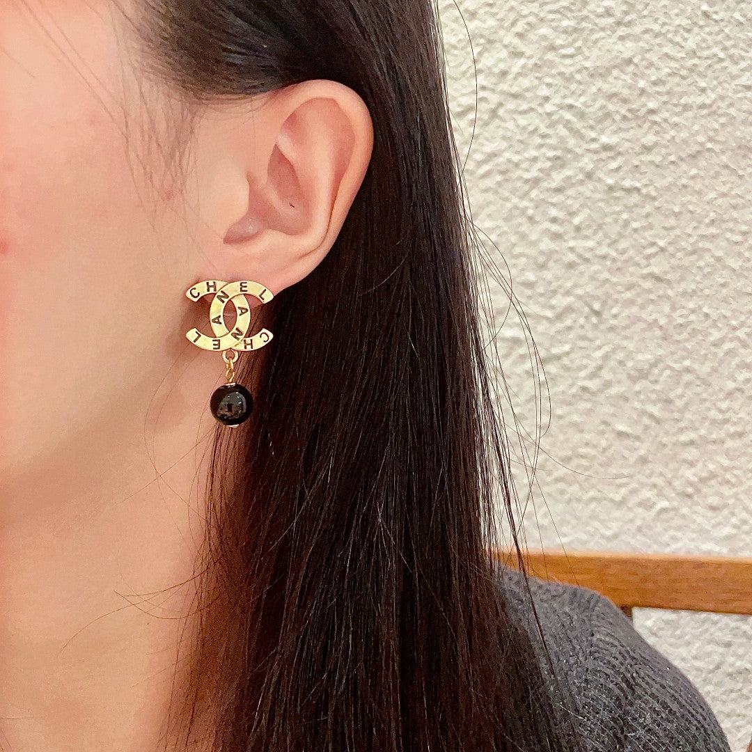 Martin Graham earrings in polished metal-tone – detail view