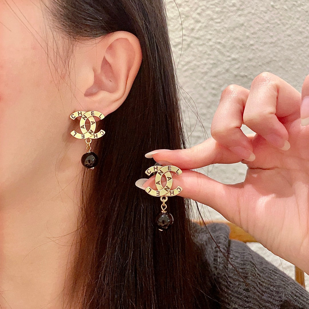 Martin Graham earrings in polished metal-tone – main product view