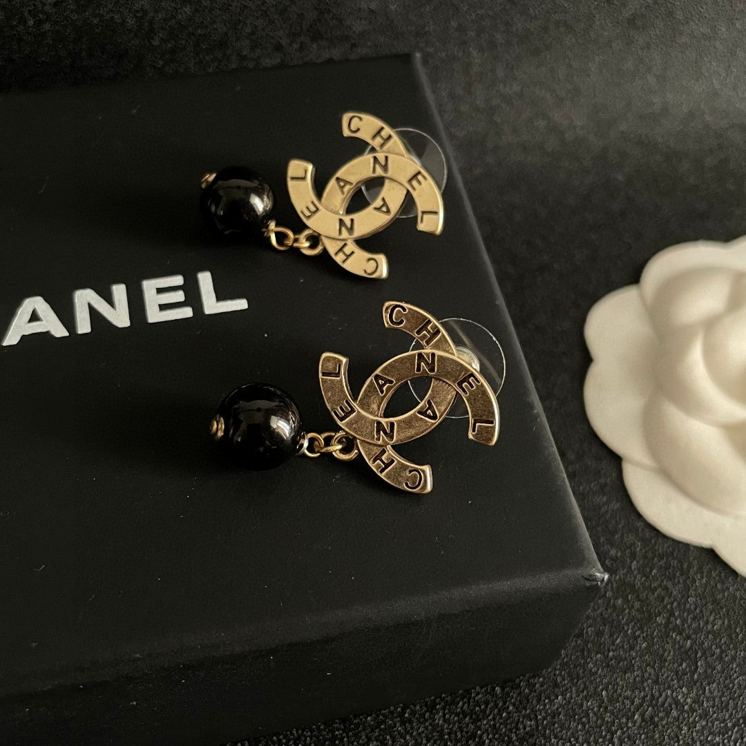 Martin Graham earrings in polished metal-tone – detail view
