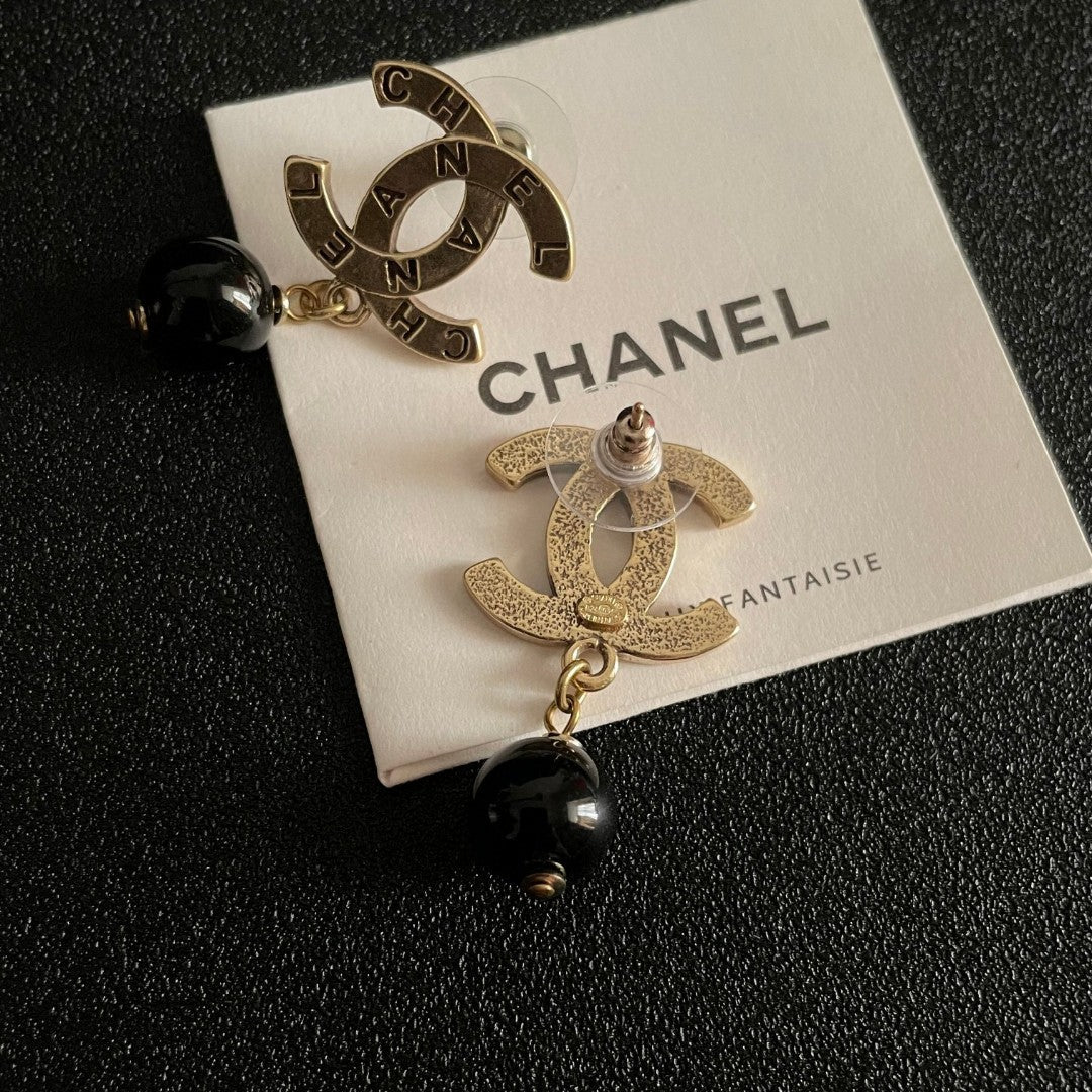 Martin Graham earrings in polished metal-tone – main product view