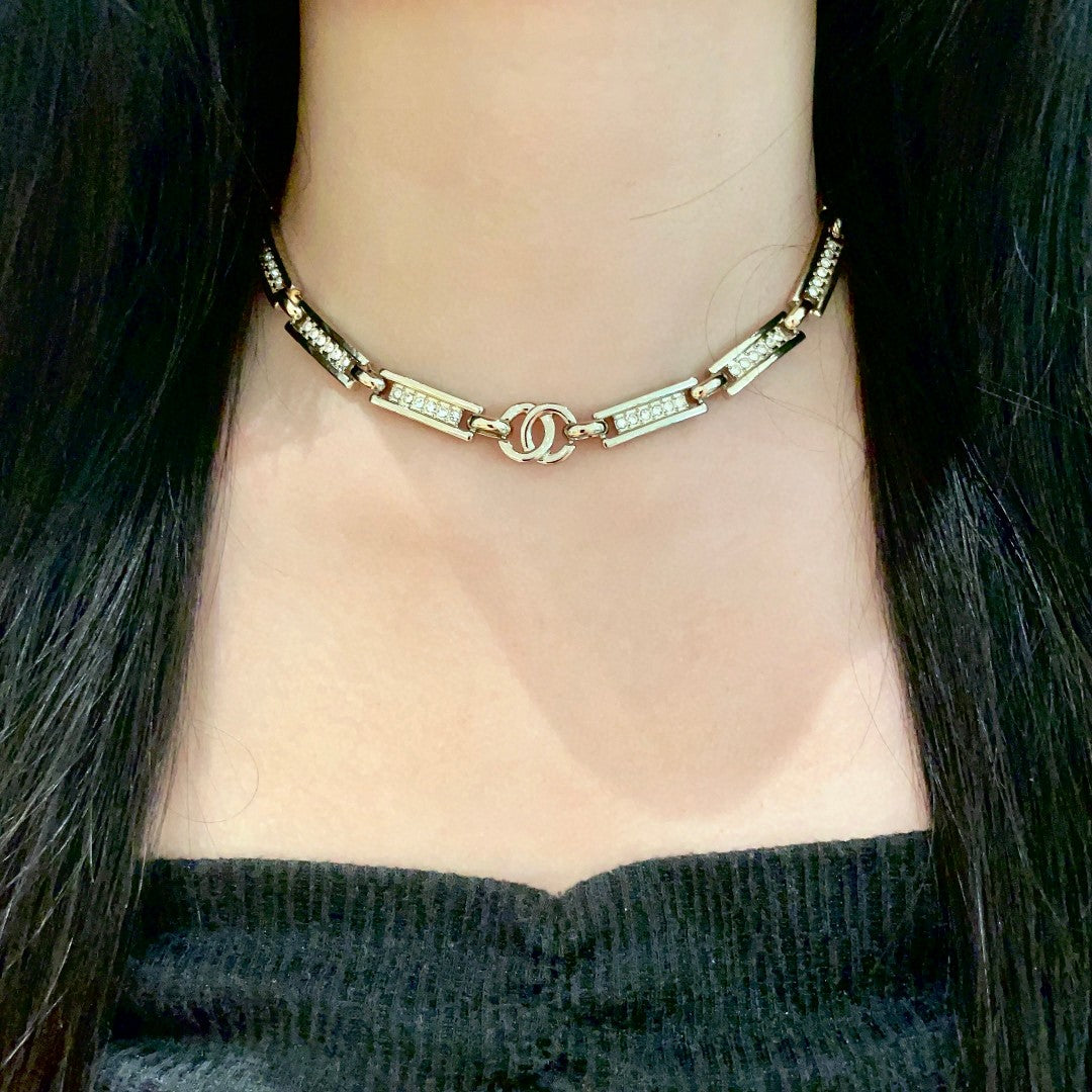 Martin Graham pendant necklace in polished metal-tone – detail view
